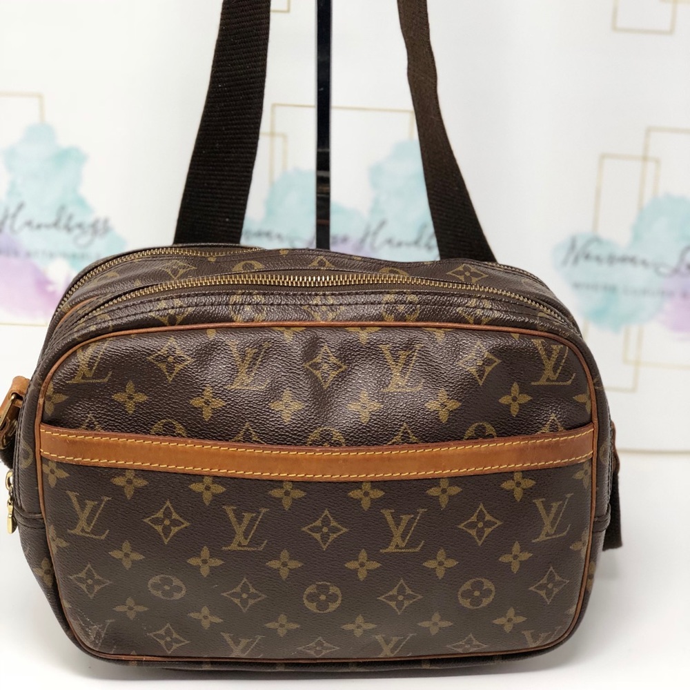 SOLD. Louis Vuitton Reporter GM